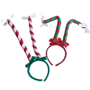 Christmas striped candy cane headbands with red and green bows and bells decorations