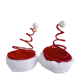 Festive red spiral spring Christmas hats with white plush trim and golden bells for parties