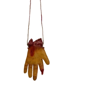Realistic severed hand Halloween prop with bloody details and hanging ropes for horror decor