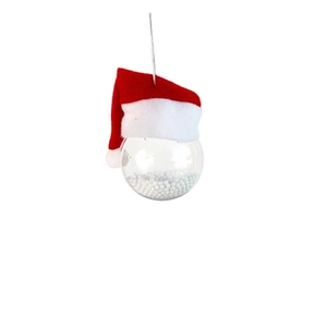 Detailed view of a clear Christmas ornament ball with a red hat and white foam snow