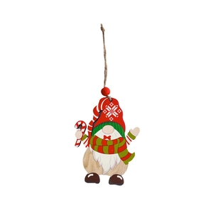 Detail of wooden Christmas gnome ornament with red hat and candy cane decoration