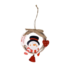 Detailed view of snowman wooden ornament with heart accent and a red metal bell