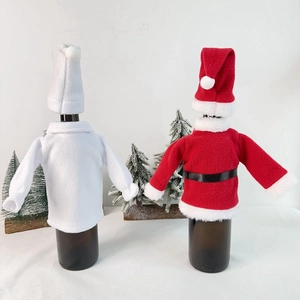 Christmas wine bottle covers with Santa clothes and hats for festive table decoration