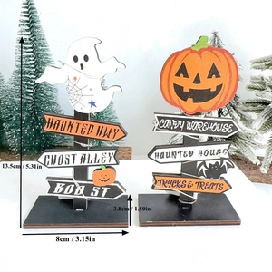 Detail of LED wooden Halloween ornaments featuring ghost and pumpkin signs with size specs