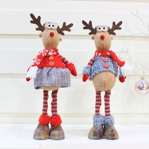 Standing plush Christmas reindeer dolls with long striped legs and knitted outfits