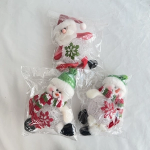 Three LED Christmas dolls with Santa and snowmen featuring glowing acrylic bodies