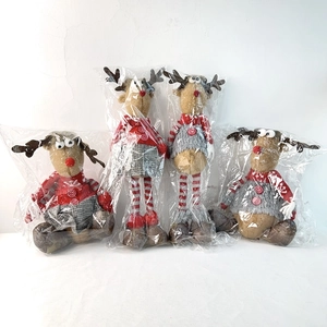 Detail of Christmas reindeer plush doll set with knitted sweaters and red ball noses