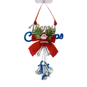 Macro detail of Christmas Santa bell ornament with red velvet bow and silver bells