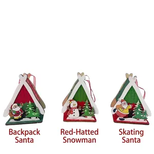 Three wooden Christmas ornaments featuring Santa and Snowman in a lit cabin design