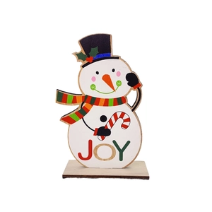 Detailed view of a wooden snowman Christmas ornament with striped scarf and JOY lettering