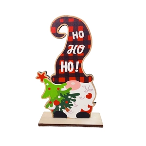 Detailed view of a wooden Christmas gnome ornament with HO HO HO text and tree