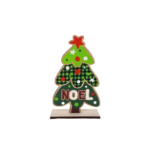 Detail of wooden Christmas tree ornament with Noel lettering and plaid patterns
