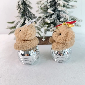 Brown plush teddy bear figurines on shiny disco ball bases for Christmas decor