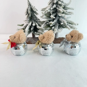 Three disco ball teddy bear ornaments with red, gold, and silver bows for Christmas decor