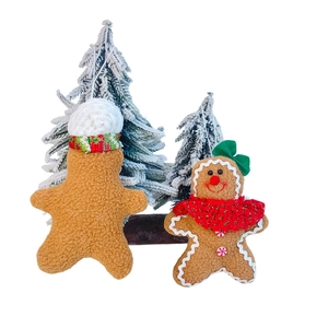 Christmas plush gingerbread man ornaments with soft fleece texture and hanging loops