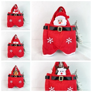 Detail of Christmas Santa trousers gift bags with plush snowman and reindeer figurines