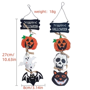 Detail of wooden Halloween hanging signs featuring pumpkins, ghosts, and bats with twine