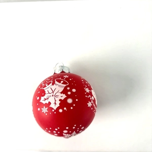 Red PET Christmas ball ornament with white snowflake patterns and Merry Christmas text