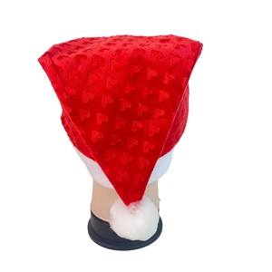 Christmas hat with heart embossed pattern and soft white plush trim for holiday decoration