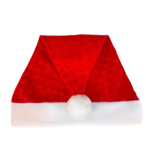 Detail of red velvet Christmas hat featuring embossed heart patterns and white plush trim