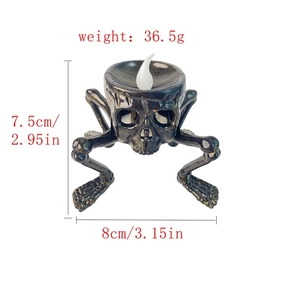 Detail view of Halloween skeleton candle holder with dimensions 7.5cm and 8cm
