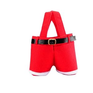Christmas Santa Claus trousers gift bag with black belt and white fur trim on white background