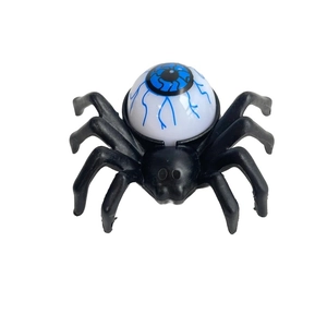 Detail of a black Halloween spider LED light featuring a realistic blue-veined eyeball accent