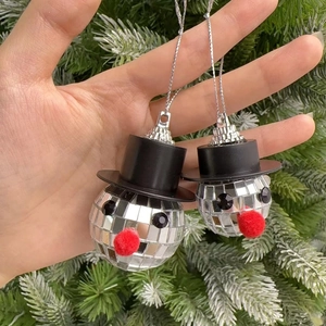 Disco ball snowman Christmas tree ornaments with black top hats and red pompom noses