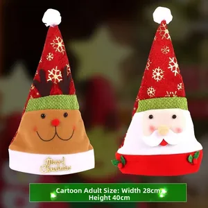 Detail of Christmas hats with cartoon reindeer and Santa motifs and gold lettering