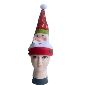 Tall Christmas hat with gold sequins, Santa face detail, and white pom pom on mannequin