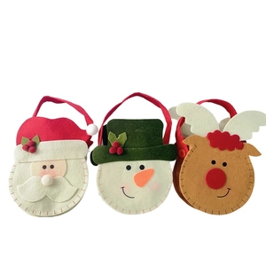 Set of 3 felt Christmas candy bags featuring Santa Claus, Snowman, and Reindeer designs