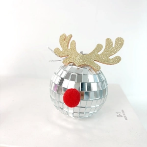 Detail of disco ball reindeer ornament with silver mirrors, red nose and gold glitter antlers