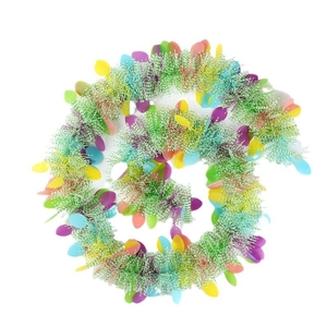 Detail of Easter tinsel garland with colorful egg sequins and green white streamers