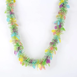 Close-up of Easter tinsel garland with green stripes and colorful oval ornaments