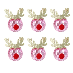Detail view of pink disco mirror Christmas balls with golden reindeer antlers and red nose