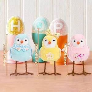 Close-up of Easter plush chicks decorations in various colors with height measurement details