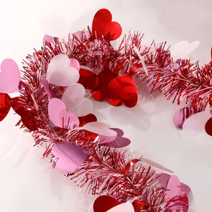 Detail of red pink white heart tinsel garland for Valentine's wedding party decoration