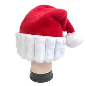 Close-up of thick plush Santa hat with textured white trim and fluffy pompom on mannequin