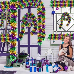 Detail of plush Mardi Gras tinsel garland in purple green and gold for festive party decor