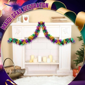 Detailed view of Mardi Gras tinsel garland in purple gold and green on a fireplace