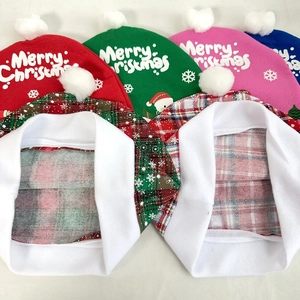 Various colorful Christmas car seat covers featuring Merry Christmas text and plush pom poms