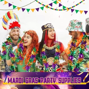 Group of people wearing colorful Mardi Gras party costumes with tinsel and feather headpieces