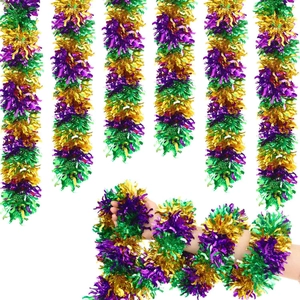 Macro view of purple, green, and gold Mardi Gras tinsel garland with metallic glitter