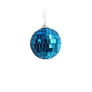 Close-up of a blue disco mirror ball with reflective square tiles and a silver hanging ring