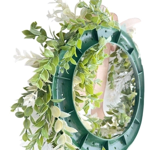 Artificial green leaf wreath base with linen bow for home wall and door decor