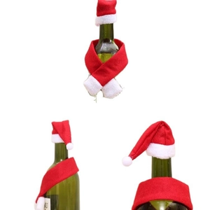 Mini Christmas hat and scarf set decorating a wine bottle for festive holiday table settings
