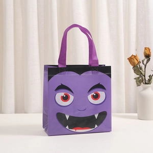 Purple Halloween non-woven gift bag with cartoon vampire face print and purple handles