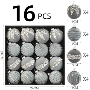 Detail view of 16-piece grey velvet Christmas ornaments with glitter and wave patterns