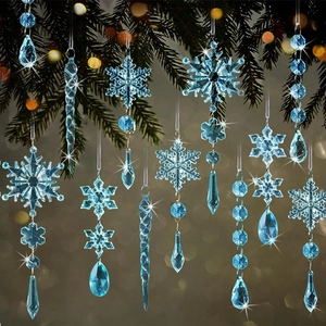 Clear acrylic snowflake and icicle ornament set hanging on a green Christmas tree