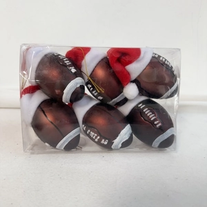 Set of 6 brown football ornaments with red Christmas hats in a transparent box
